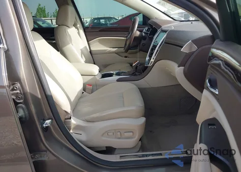 2016 Cadillac Srx Premium Collection z USA, uszkodzony, nr VIN 3GYFNDE3XGS526820